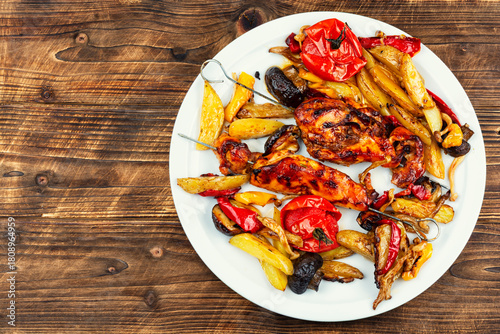 Chicken breast baked in vegetables.