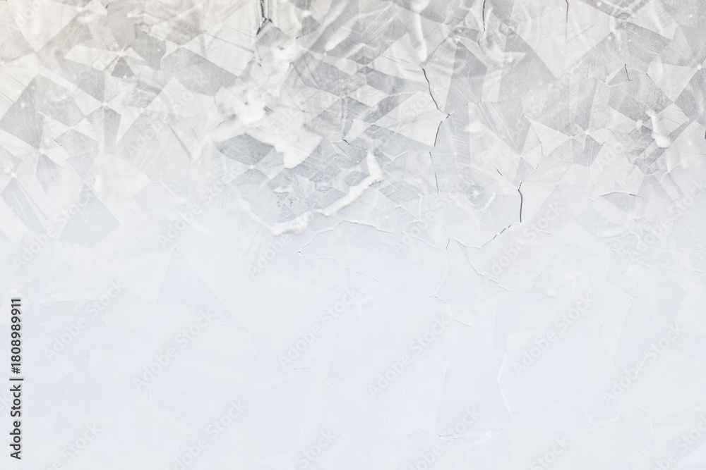 Naklejka premium white winter background, frosty patterns on glass, abstract backdrop of ice and snow crystals in a blur