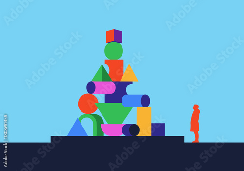 Colorful geometric shapes tower with human figure on blue background