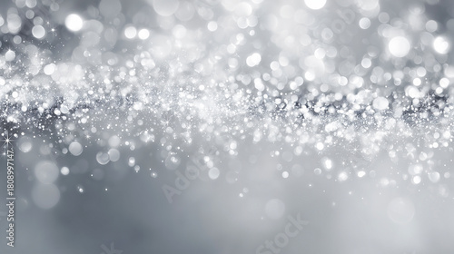 シルバーのキラキラ光ボケ背景