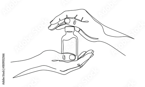 Hands carefully transfer small glass bottle with liquid EPS