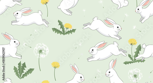 Cute seamless spring pattern with white rabbits hopping and jumping among yellow dandelions on a light green background.