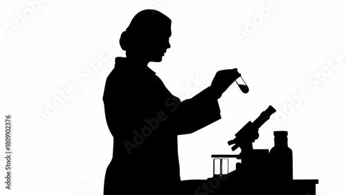 Silhouette of a scientist holding a test tube next to a microscope in a laboratory setting
