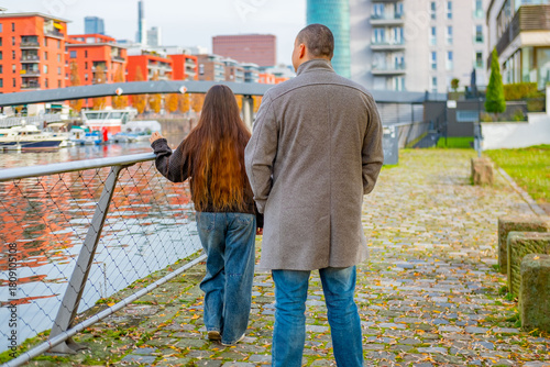 Sad moment between young couple, serious argument or disagreement between male and female partner, emotional tension, breakup urban scene, painful moment conflict, Dramatic relationship, European city