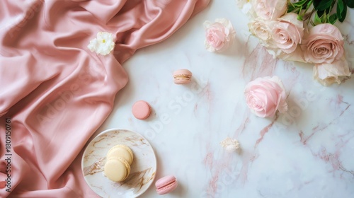 Simple Parisian Chic Flatlay, Pink Silk, Roses, and Macarons on White Marble