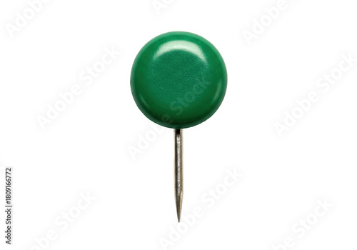 Isolated green push pin with metal needle point for attaching items to surfaces or boards
