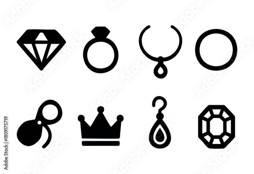 A collection of jewelry icons includes a diamond, different rings, a crown, and earrings, all depicted in a minimalist black and white style, perfect for design projects.