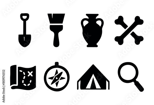 Various tools and symbols related to adventure and treasure hunting are shown, including a shovel, paintbrush, vase, bones, map, compass, tent, and magnifying glass.