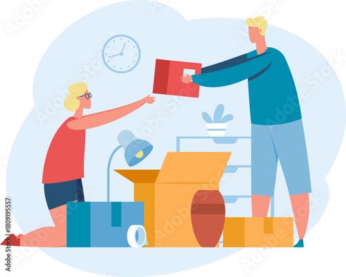 Couple packing boxes for home relocation