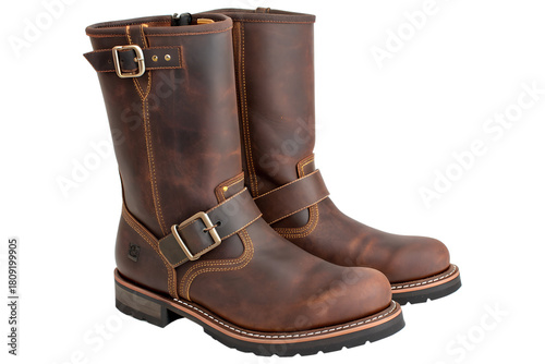 A pair of men's Timberland brown leather engineer motorcycle boots with buckle straps, isolated on a white background