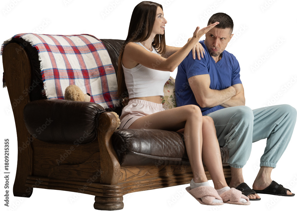 Obraz premium Couple sitting on sofa having emotional conversation with expressive gestures on transparent background. Concept of communication visuals, relationship tension, and lifestyle storytelling.
