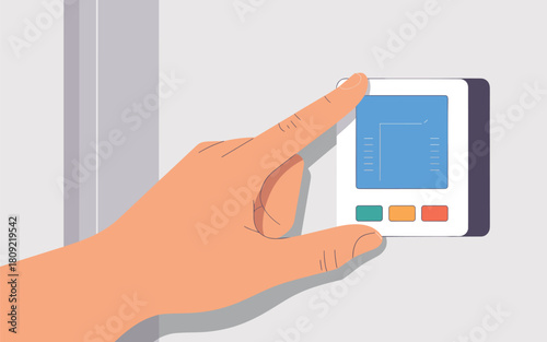 Hand adjusting a smart home thermostat for temperature control and energy efficiency