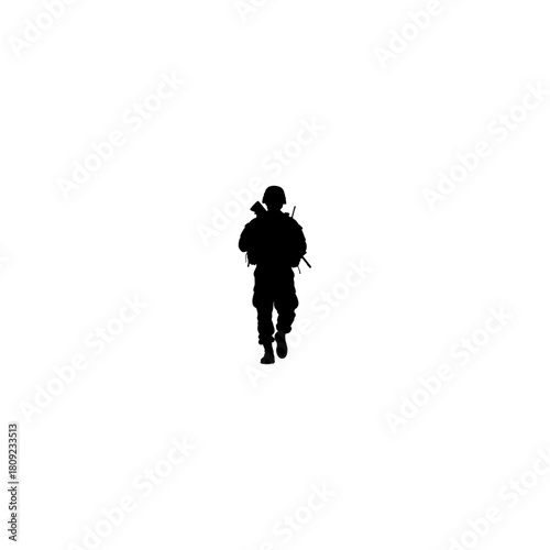 Silhouette of a soldier walking forward with a rifle on a white background in a full body shot view