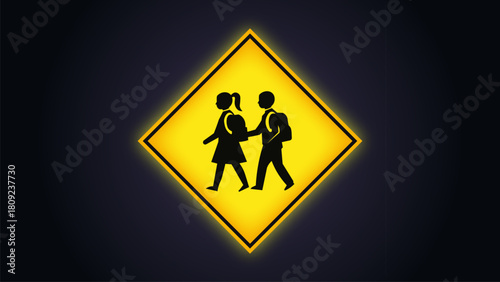 School zone warning sign depicts two young students walking together as a bright yellow graphic icon on a deep dark background