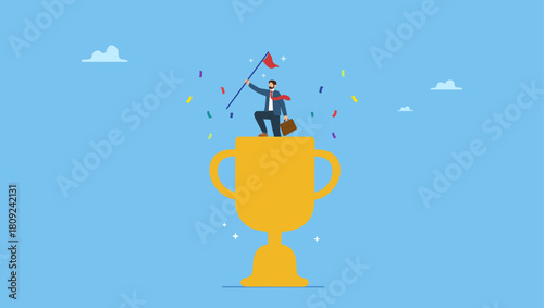 Cheerful businessman winner raising flag on winning trophy. Victory or business achievement, triumph or award winning, accomplishment for leadership success, determination for career success.