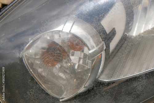 Foto Close up of dull car headlamp