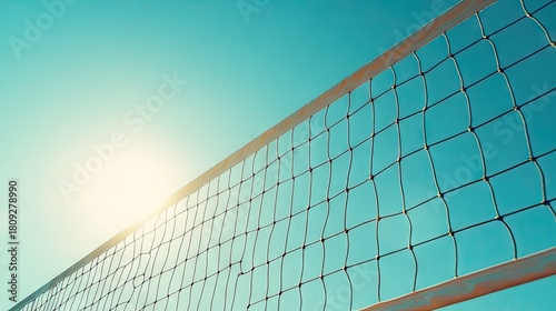 Bright Sunny Day with Volleyball Net Against Clear Blue Sky Providing a Perfect Setting for Outdoor Sports Activities and Summer Fun