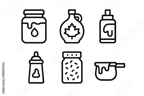 Sweet breakfast toppings set with honey jar, maple syrup jug, jam, and sauce bottles