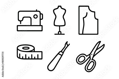 Essential sewing and tailoring equipment including machine, scissors, and measuring tape