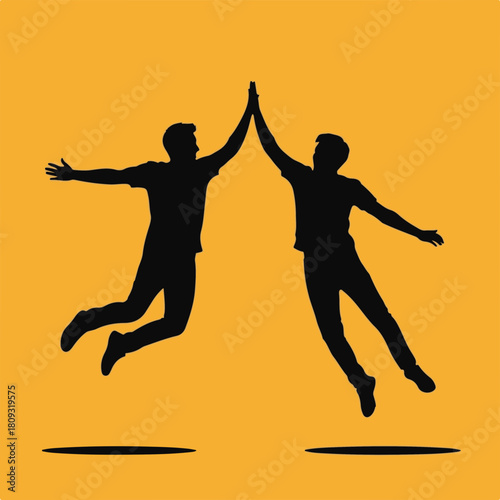 Silhouetted men jump high-fiving against orange background. Two men high-fiving show success and friendship. Silhouette highlights their enthusiastic collaboration,
