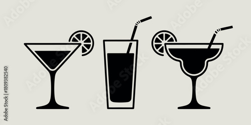 Three silhouette cocktail glasses with lime slices and straws