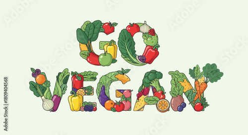 Go Vegan Message Formed with Fresh Fruits and Vegetables on Green Background