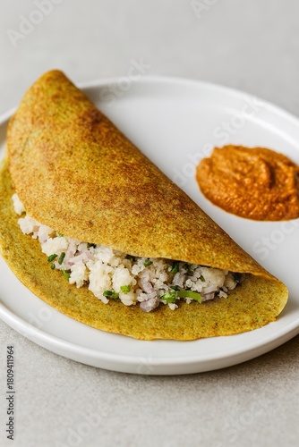 Pesarattu Upma Andhra green gram dosa with soft upma filling and ginger chutney presentation