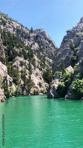 View of the lake with green water and on the mountain cliffs of the Green Canyon. Manavgat, Antalya, Turkey