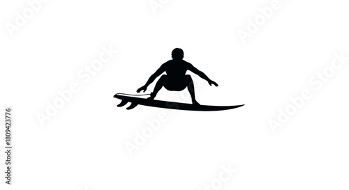 Dynamic silhouette of surfer riding wave, embodying freedom and adventure on the water, perfect for summer promotions or active lifestyle campaigns