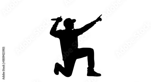 Dynamic silhouette of a hip hop artist performing live with a microphone, capturing the energy and passion of a modern concert or urban music scene.