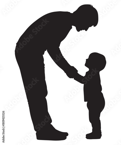 Father holding hands with his child in a heartwarming silhouette