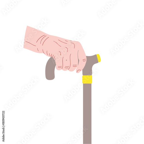 Elderly hand gripping a cane in a supportive and steady manner  