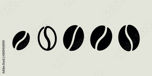 Five stylized black coffee beans in a row on a light background