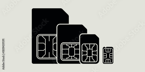 Collection of black sim cards in different sizes on a light background