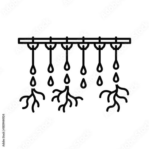 Drip irrigation system watering plant roots, agriculture and farming