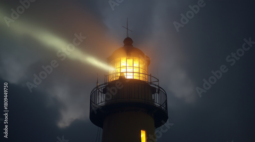 sailor. Lighthouse beam cutting through morning fog at a coastal maritime scene. travel magazines, destination branding, designed for outdoor magazines and nature guides, used by event planners.