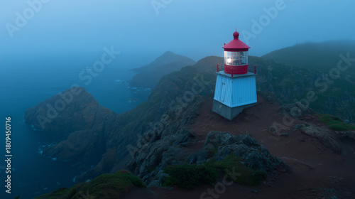 sailor. Lighthouse beam cutting through morning fog at a coastal maritime scene. travel magazines, destination branding, designed for outdoor magazines and nature guides, used by event planners.