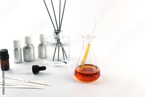 Tableau sur toile chemical beaker or flask is used on white table with blotting paper fragrance bo