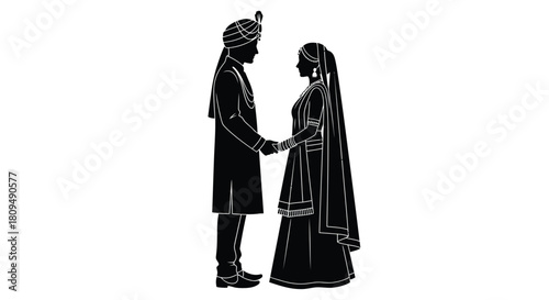 Silhouette of a traditional indian wedding couple holding hands in profile