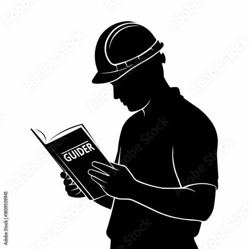 Silhouette of a construction worker reading a manual.