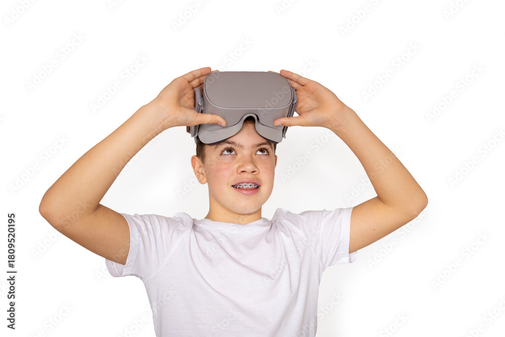 Naklejka premium Teen boy raising vr headset looking up