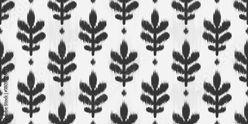 Ikat seamless pattern with floral motif. Abstract vector tribal rug textured design. Traditional orient ornament for textile. Decorative Uzbekistan background.