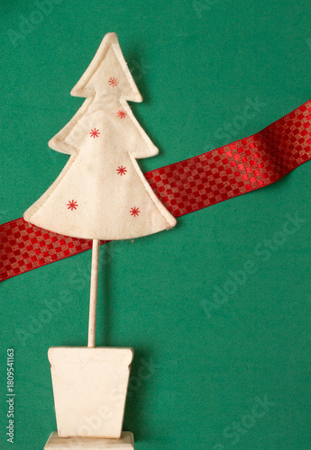 Christmas tree on a green background - Christmas time