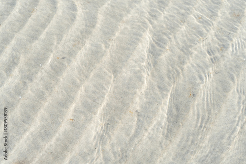 Fototapeta Naklejka Na Ścianę i Meble -  Shallow water soft sand and Baltic Sea coastal structures combine to create a gentle natural beach atmosphere