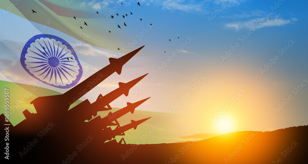 Fototapeta premium The missiles are aimed at the sky with birds at sunset with Indian flag. Nuclear bomb, chemical weapons, missile defense, a system of salvo fire.