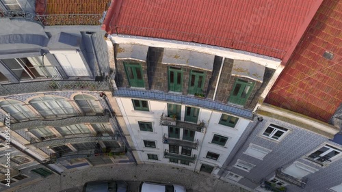 Curvy Street in Lisbon with Azulejo Fascades. Aerial Shot of Traditional Portuguese Houses decorated with Ceramic Tiles