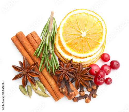 Wallpaper Mural Different spices, cranberries, dry orange slices and fresh rosemary for mulled wine isolated on white, top view Torontodigital.ca