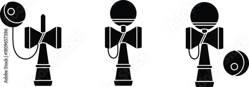 Illustration of three black kendama toys in different positions