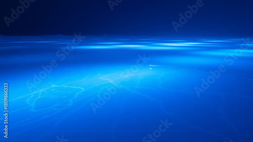 Frozen surface illuminated by pale blue light