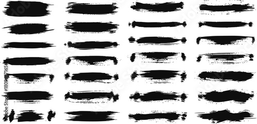 Black brush strokes set on a black background for design